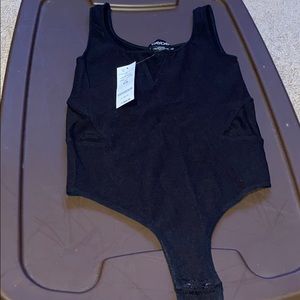 NEW BEBE TRIANGLE MESH CUT OUT BODYSUIT.